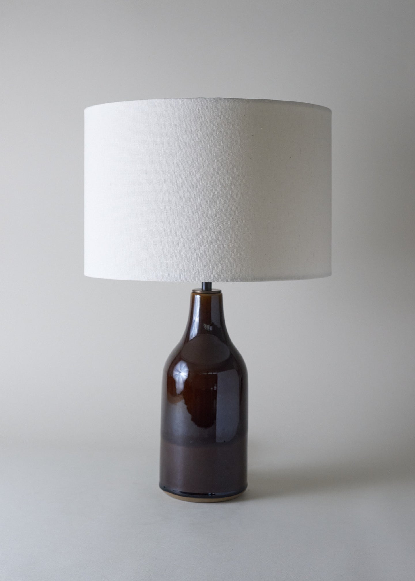 Small Bottle Lamp In Dark Amber - Victoria Morris Pottery