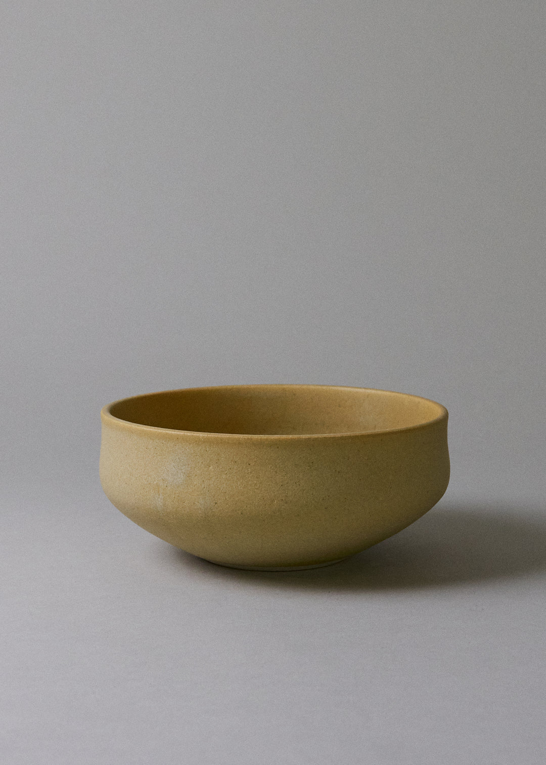 Rounded Bowl in Ochre - Victoria Morris Pottery